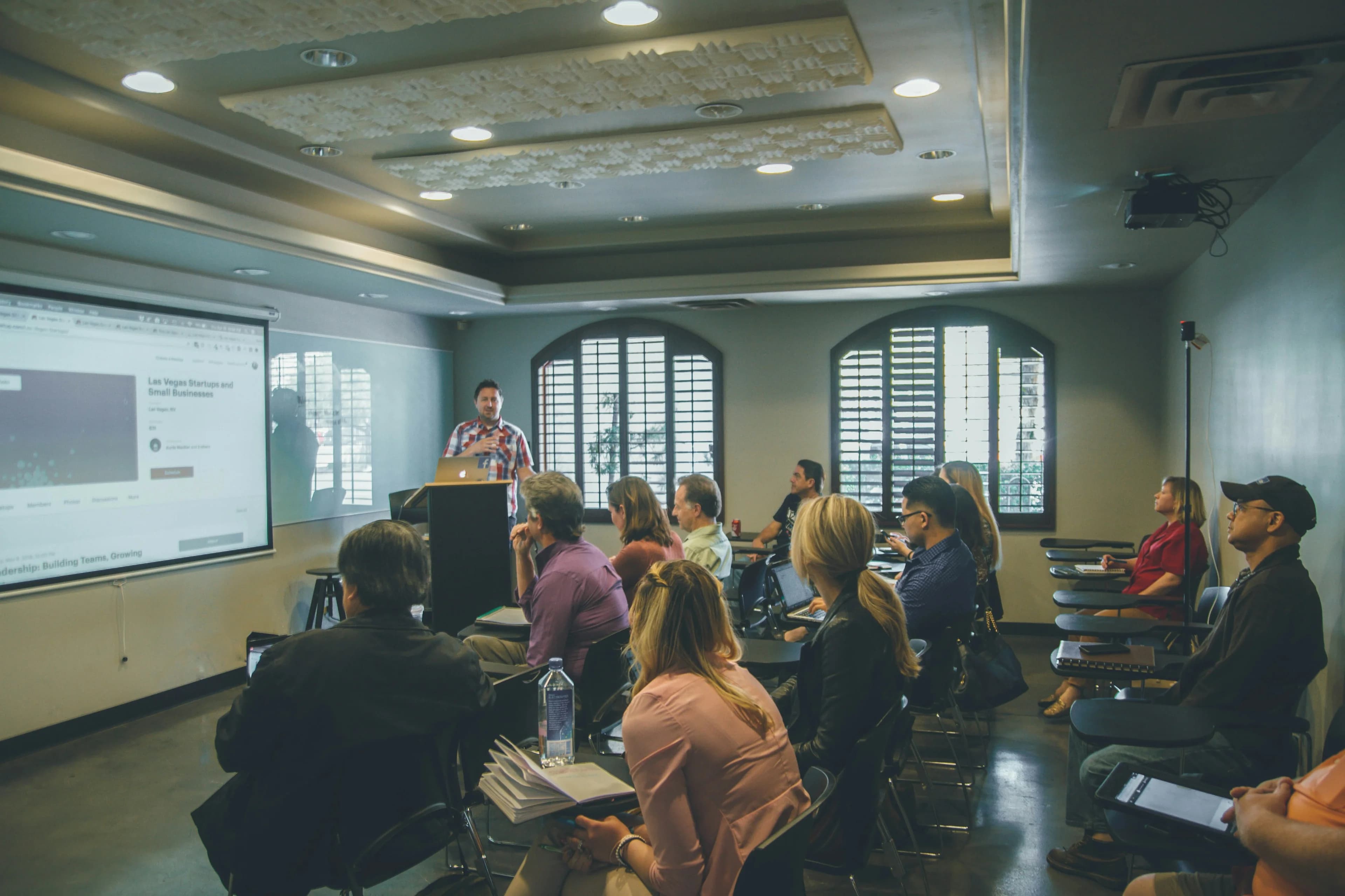 Professionals in an executive learning and development session