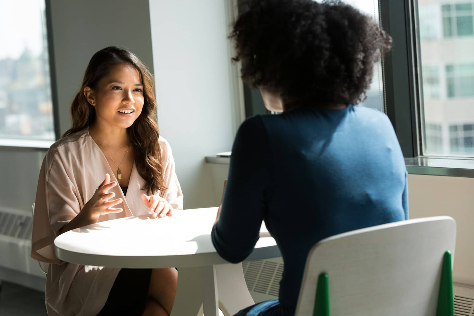 Professional reviewing personal finances during an individual financial health check.